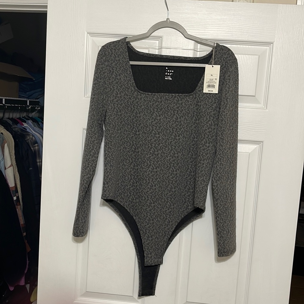 A New Day NWT long sleeve gray leopard body suit